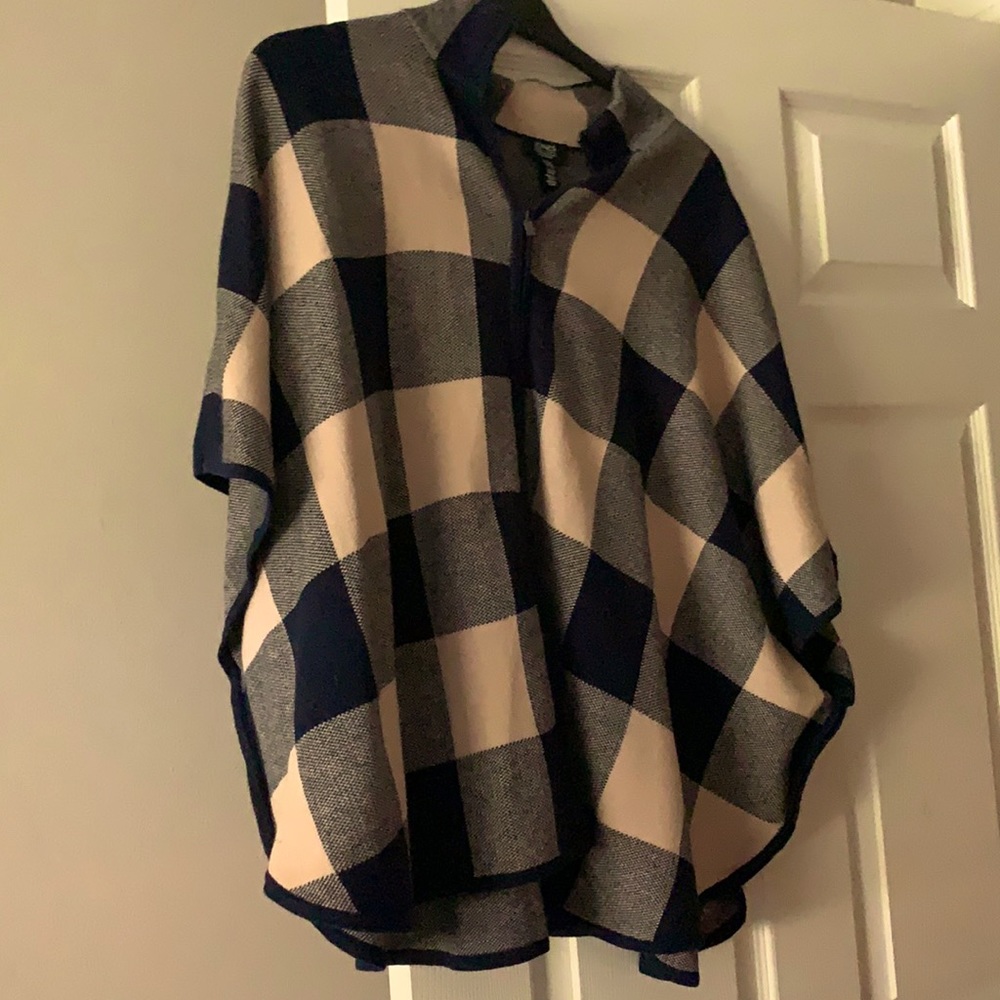 Think fall with a plaid poncho